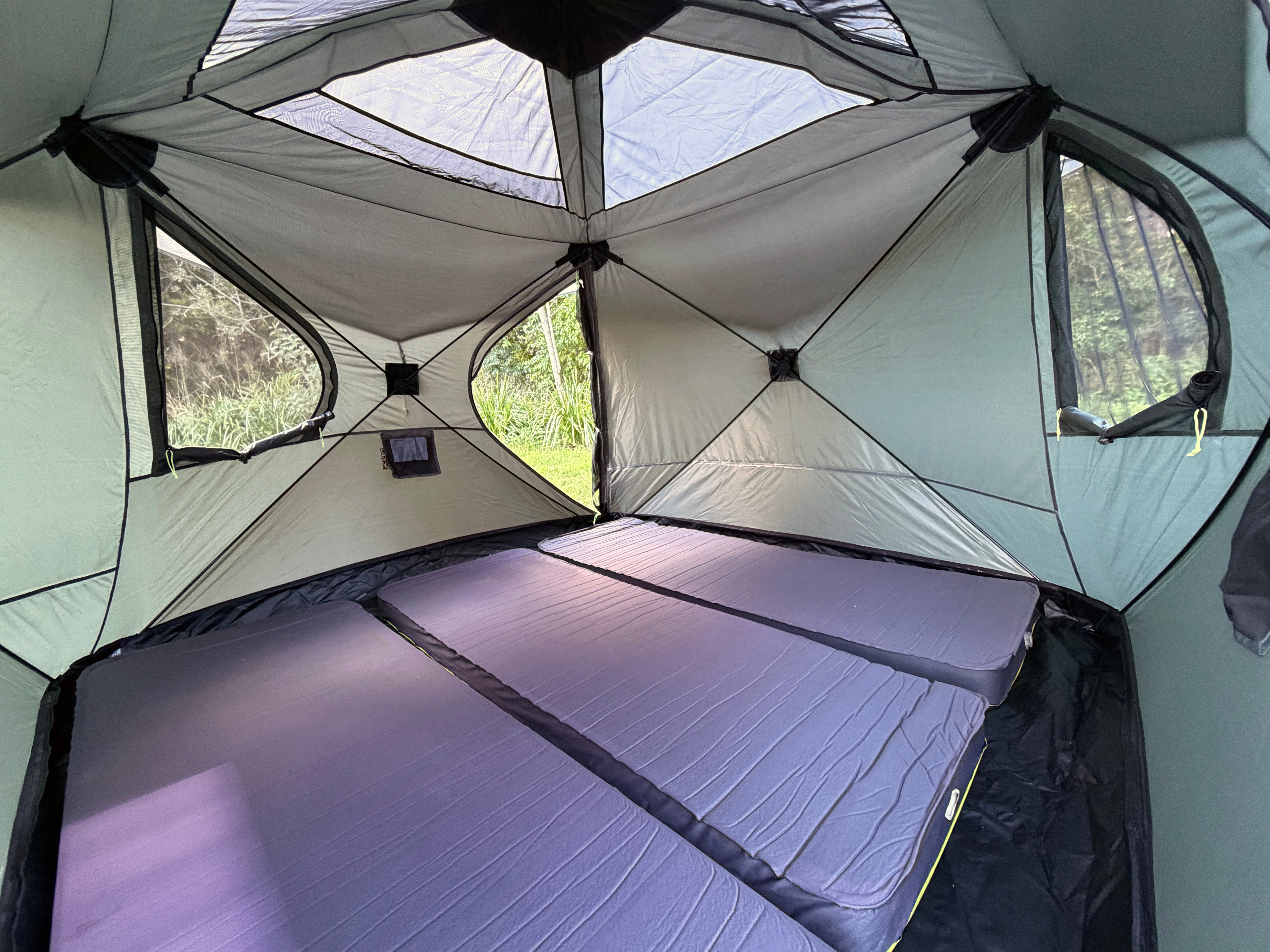 RapidPack pop up tent spacious interior with three full sized camping mattresses