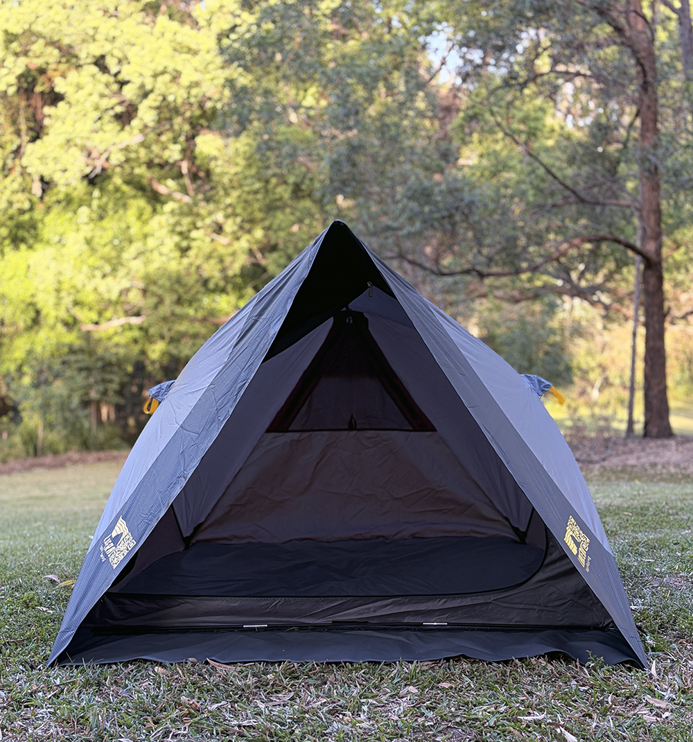 Pop-up style swag tent. Looking through to the window