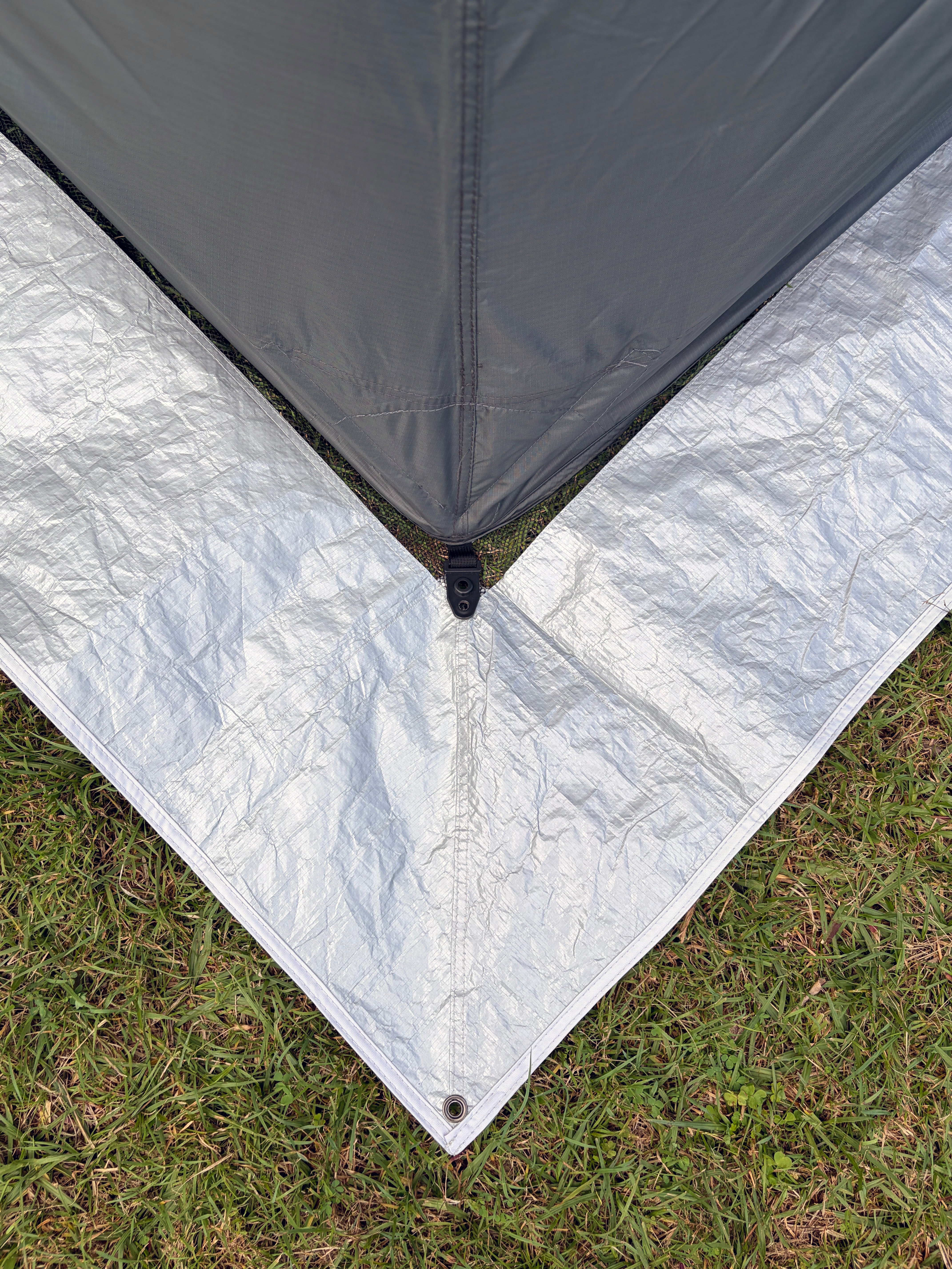 RapidPack ground sheet close up with corner of tent