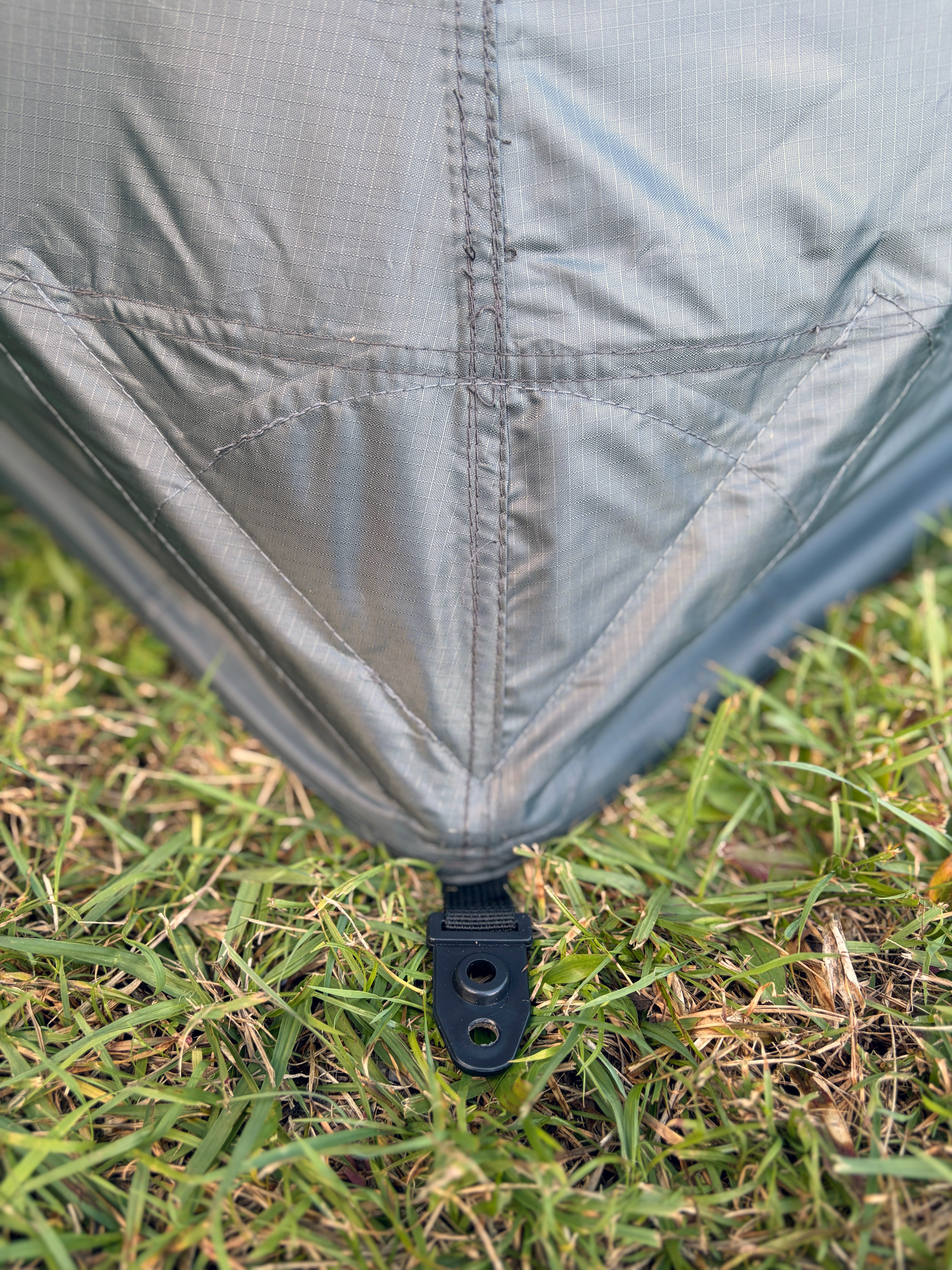 RapidPack pop up tent can be pegged down in the corners if it is windy. 